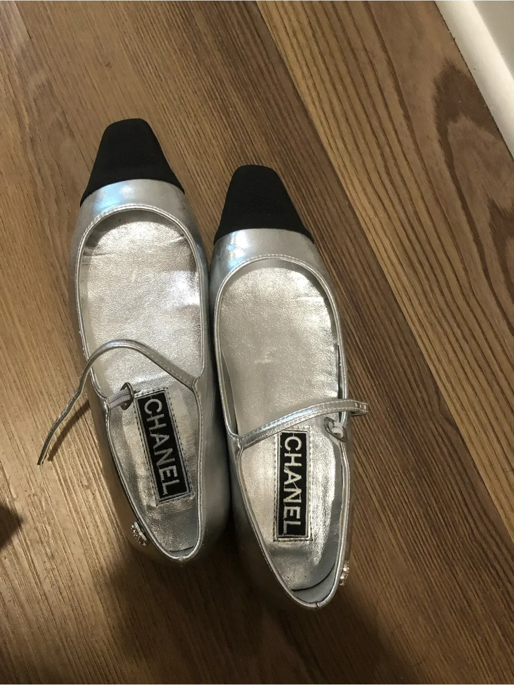 CHANEL Silver Metallic Mary Jane Flats with Black Cap Toe